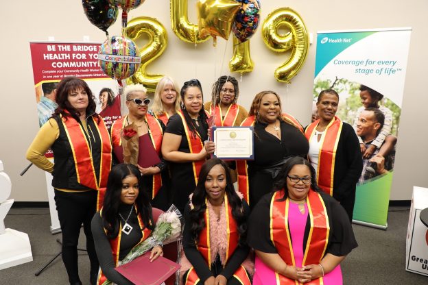 Inaugural Community Health Worker Cohort showing diplomas