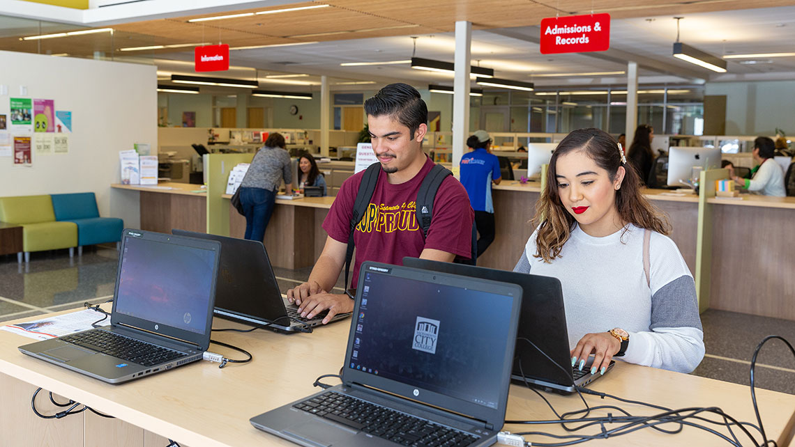 EOPS students using laptops in the SCC Welcome Center