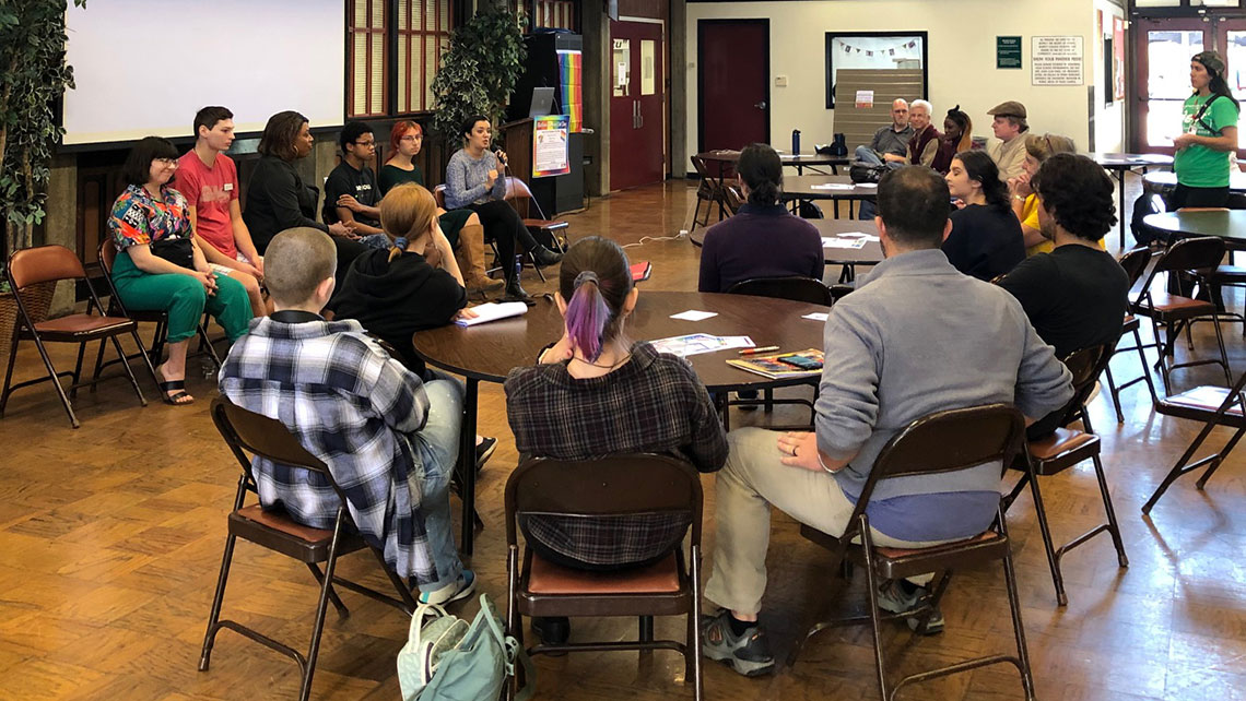 National Coming Out Day panel presentation with staff and students