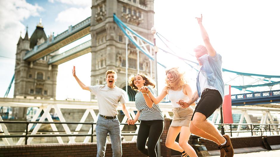 London, England students jumping in front of Big Ben